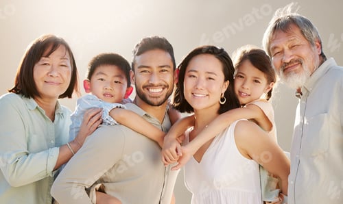 Preview: Family is everything. Cropped shot of a happy diverse multi-generational family at the beach.