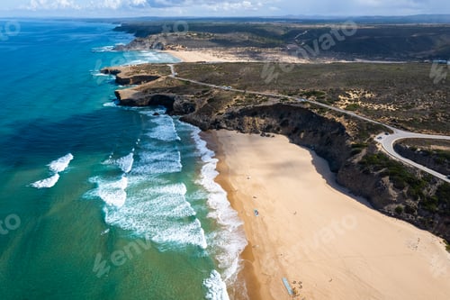 Preview: Algarve Coast in Portugal. Aerial drone view over sandy beach and Atlantic Ocean