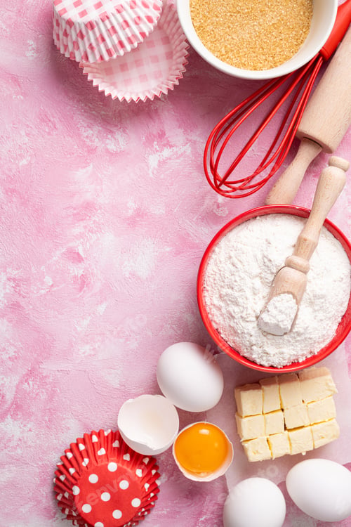 Preview: Baking background. Food ingredients for baking flour, eggs, sugar on pink background flat lay