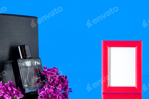 Preview: front view black fragnance with pink picture frame on blue background portrait gift scent present