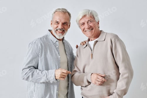 Preview: Senior Men Laughing and Looking at Camera
