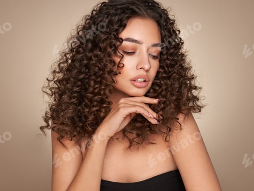 Preview: Beautiful smiling woman with afro curls