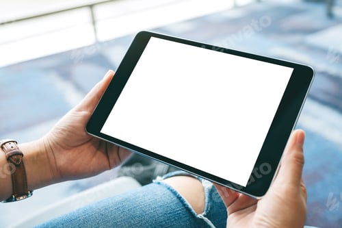 Preview: Mockup image of hands holding black tablet pc with blank white screen