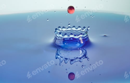 Preview: Abstract background color water splash, collision of colored drops and crown creation,