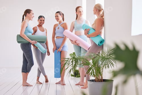 Preview: Happy women talking before yoga class. Group of friends bonding before yoga workout. Dedicated wome