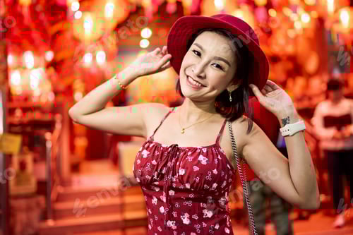 Preview: happy thai woman at temple in yaowarat china town bangkok during chinese new year