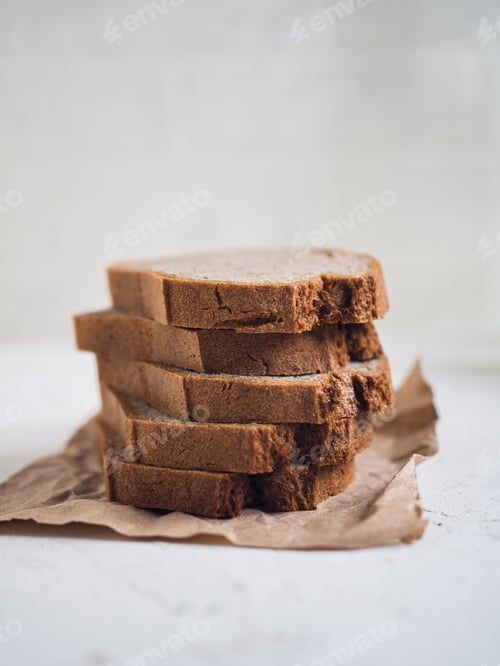 Preview: Slices of bread, brown wrapping paper, neutral background