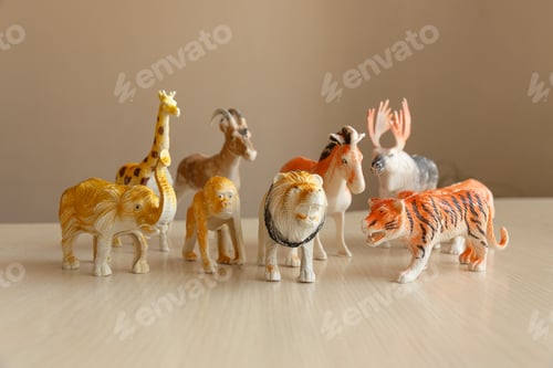 Preview: Plastic toy wild Animals collection on wooden table