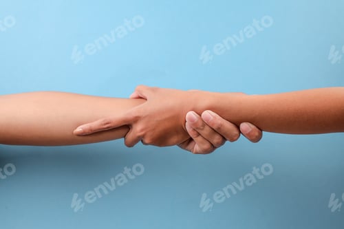 Preview: Close Up Of Holding Hands For Helping Someone Or Preventing Them From Falling.