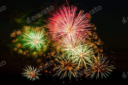 Preview: Bright colored fireworks on a festive night. Explosions of colored fire in the sky.