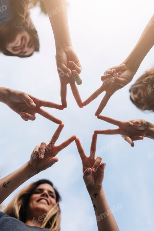 Preview: Three women shaping a star with their hands