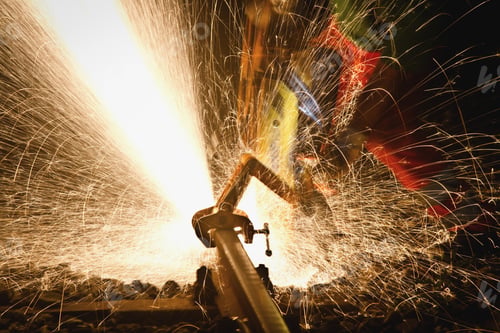 Preview: Anonymous man working with steel