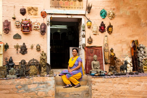 Preview: Woman tourist at golden fort Jaisalmer, India.
