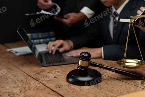 Preview: Lawyer discussing with client about contract, agreement, legal guideline, lawsuit.