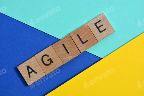 Preview: Agile, word in wooden alphabet letters isolated on colourful background