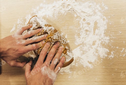 Preview: The chef prepares ginger. Christmas cookies on the table with cooking flour.