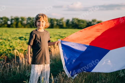 Preview: Czech little kid - patriot boy with national flag on nature background