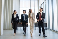 Preview: A group of young Asian businessmen Talking