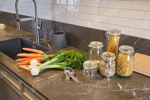 Preview: Noodles and vegetables on kitchen counter