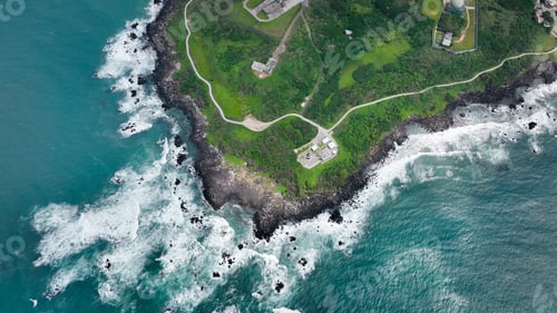 Preview: Aerial view of coastal landscape in Taiwan showcasing rocky shore and lush greenery