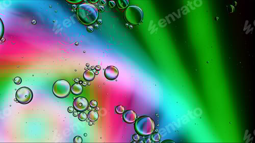 Preview: Abstract Colorful Food Oil Drops Bubbles and spheres Flowing on Water Surface