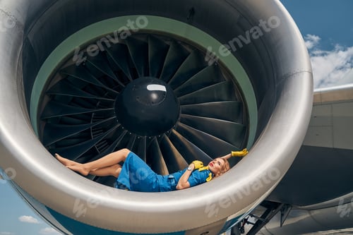 Preview: Beautiful Caucasian stewardess lost in her reverie