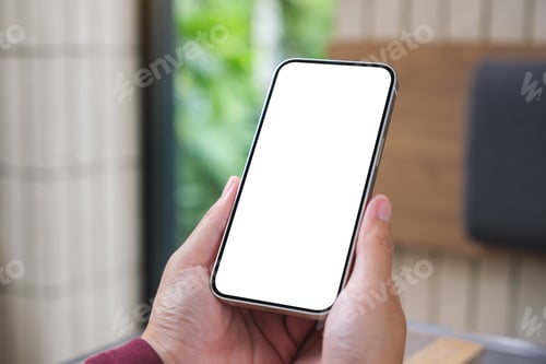 Preview: Mockup image of a woman holding mobile phone with blank desktop screen in cafe