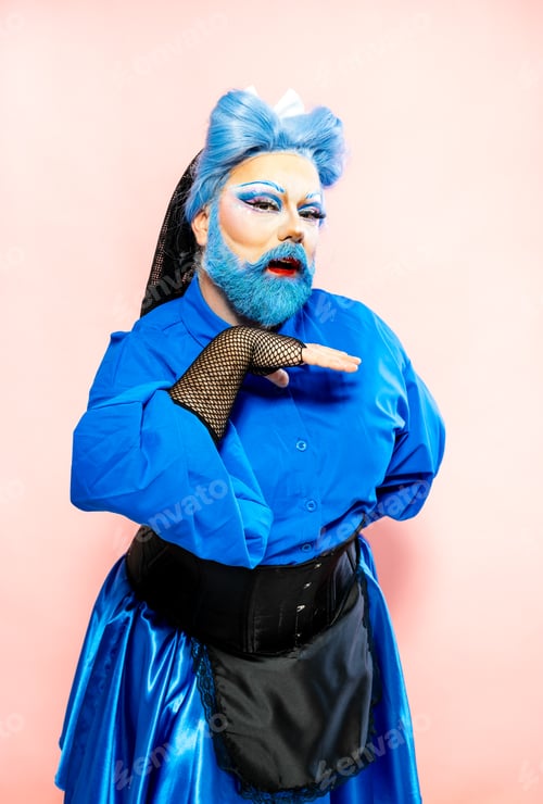 Preview: Elegant transgender standing with hand behind back