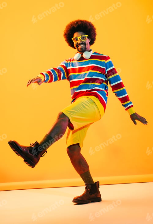 Preview: African man portrait in studio on colorful background