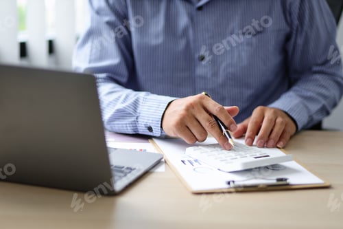 Preview: Close up bankers are calculating finances using calculators for financial planning and lending.