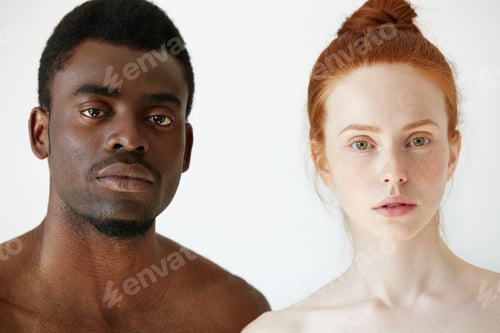 Preview: Love against racism. Black and white. Coffee and milk. Headshot of young loving multi-ethnic couple