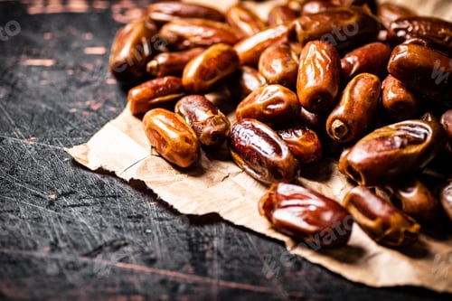 Preview: A pile of dates on paper on the table.