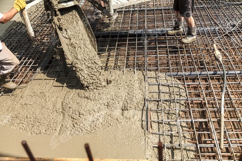 Preview: Pouring concrete into the construction of the house. Builders are pouring ready-mixed concrete