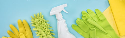 Preview: panoramic shot of cleaning supplies on blue background