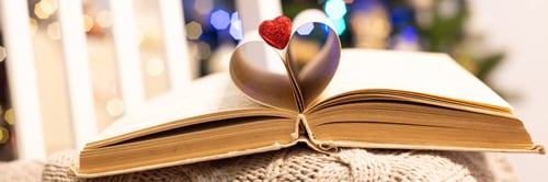 Preview: Valentine background. Valentines heart made of book sheets. Valentine's Day card. Banner format
