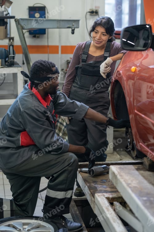 Preview: Mechanics Enjoying Work in Car Shop
