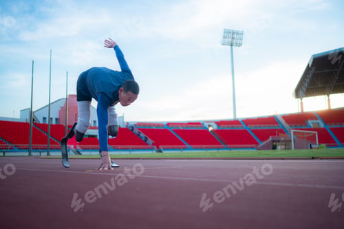 Preview: Disabled athletes prepare in starting position ready to run on stadium track