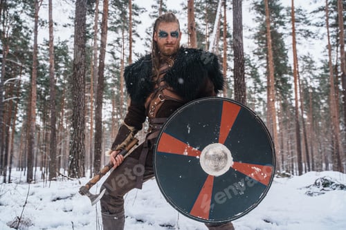 Preview: Viking Warrior with Axe and Shield in Snowy Woods