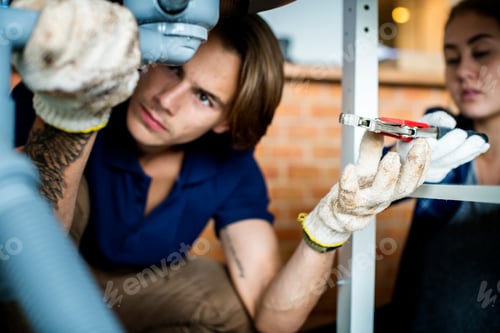 Preview: Couple fixing kitchen sink