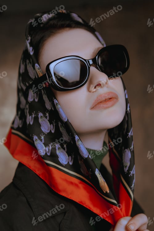 Preview: Stylish Large Portraits Of A Girl In Glasses And A Scarf In A Studio On A Canvas Background
