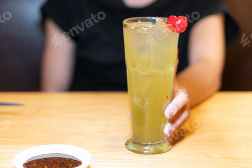 Preview: Refreshing Green Beverage with Cherry