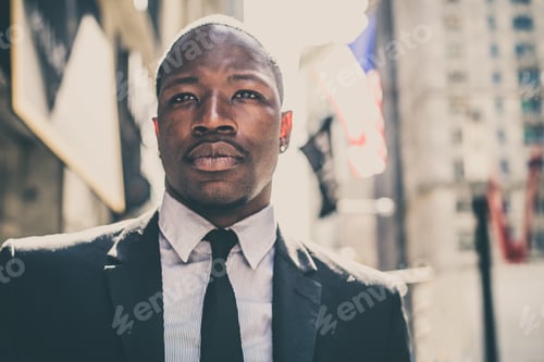 Preview: Confident businessman walking