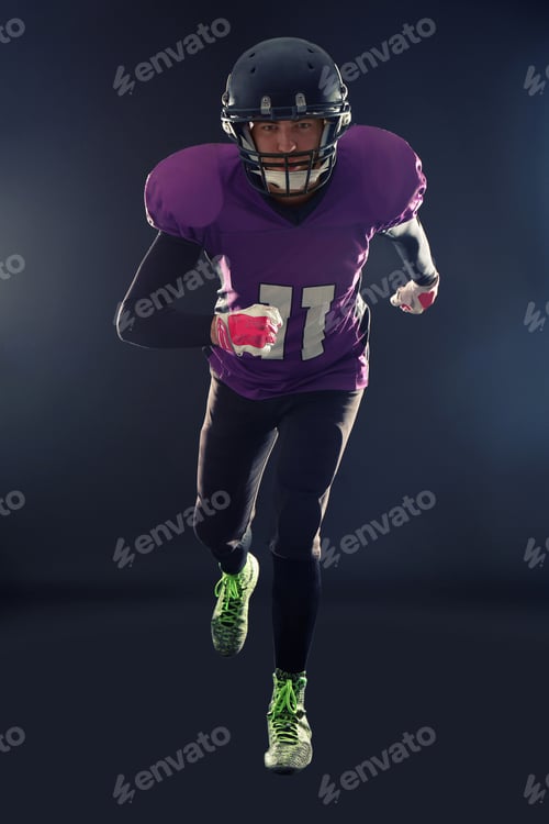Preview: American football player in uniform running on dark background
