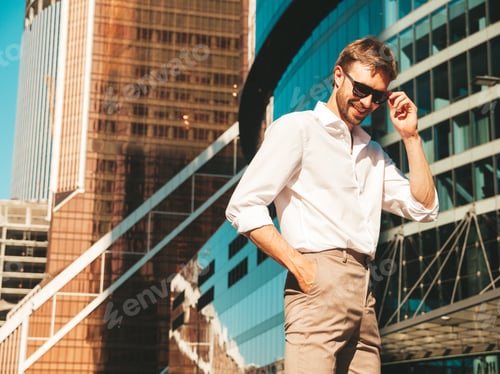 Preview: Handsome man posing outdoors