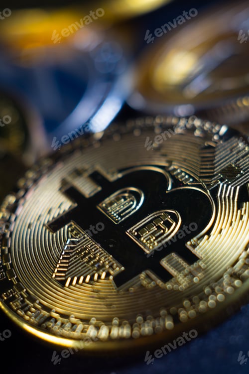 Preview: Vertical closeup shot of a shiny Bitcoin coin