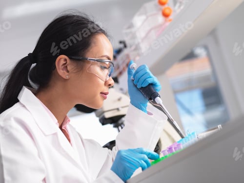 Preview: Scientist pipetting a sample into a phial during an experiment in a laboratory