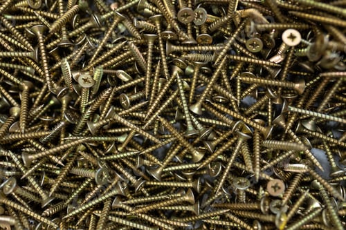 Preview: pile of screws close up, hardware store