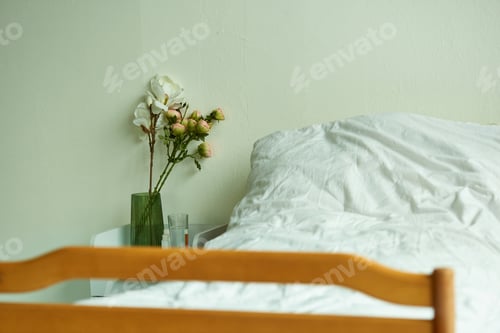 Preview: hospital private ward, bouquet of flowers in vase near bed, glass of water, hospitalization, room