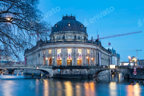 Preview: The modern backside of the City Palace, the cathedral and the river Spree in Berlin at dusk