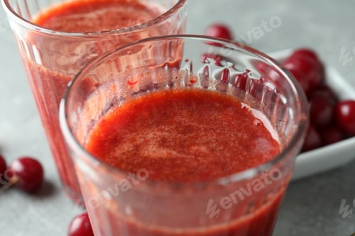 Preview: Glasses of cherry smoothie and ingredients, close up